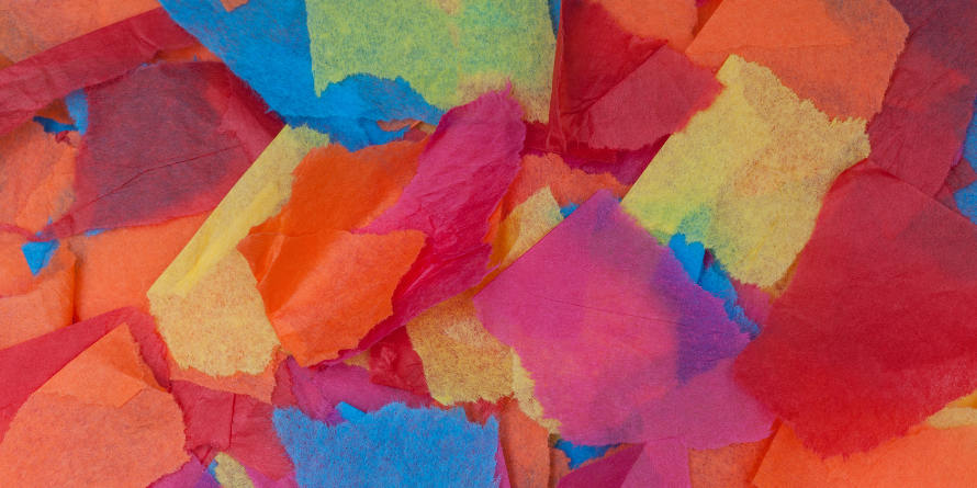 A pile of cut up colourful tissue paper.