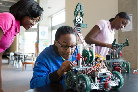 Teens making robotics.