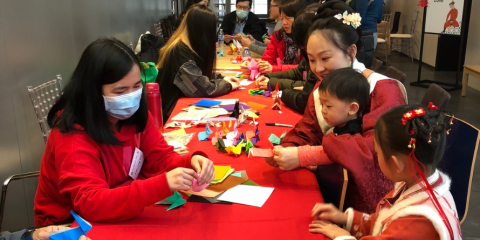 People making origami.