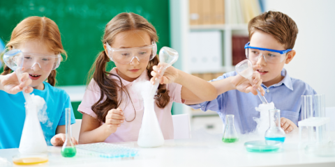 Kids doing science experiments.