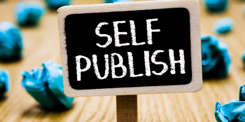 Tiny sign that reads: Self Publish.