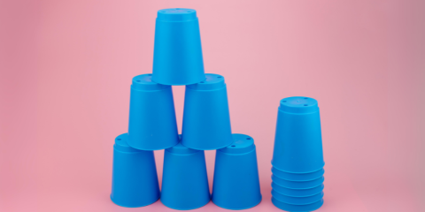 Cups stacked on a table.