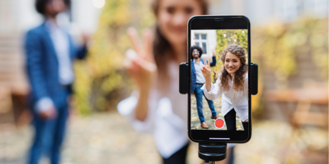 Two people filming a video.