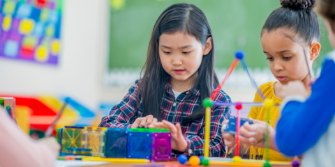 Children engaged in stem activities.