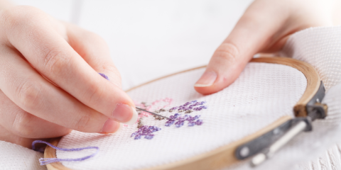 Embroidering a flower, close-up.