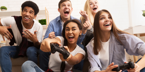 Teens playing video games