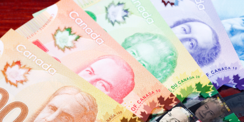 Canadian money splayed out on the table.