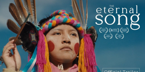 Woman in make-up and head gear, title 'the Eternal Song'.