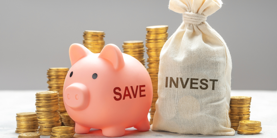 A piggy bank surrounded by gold coins.