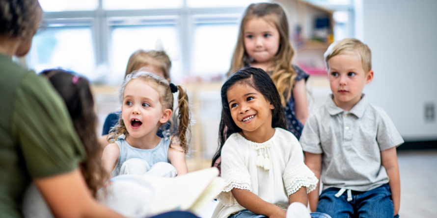 Adult reading stories to children.