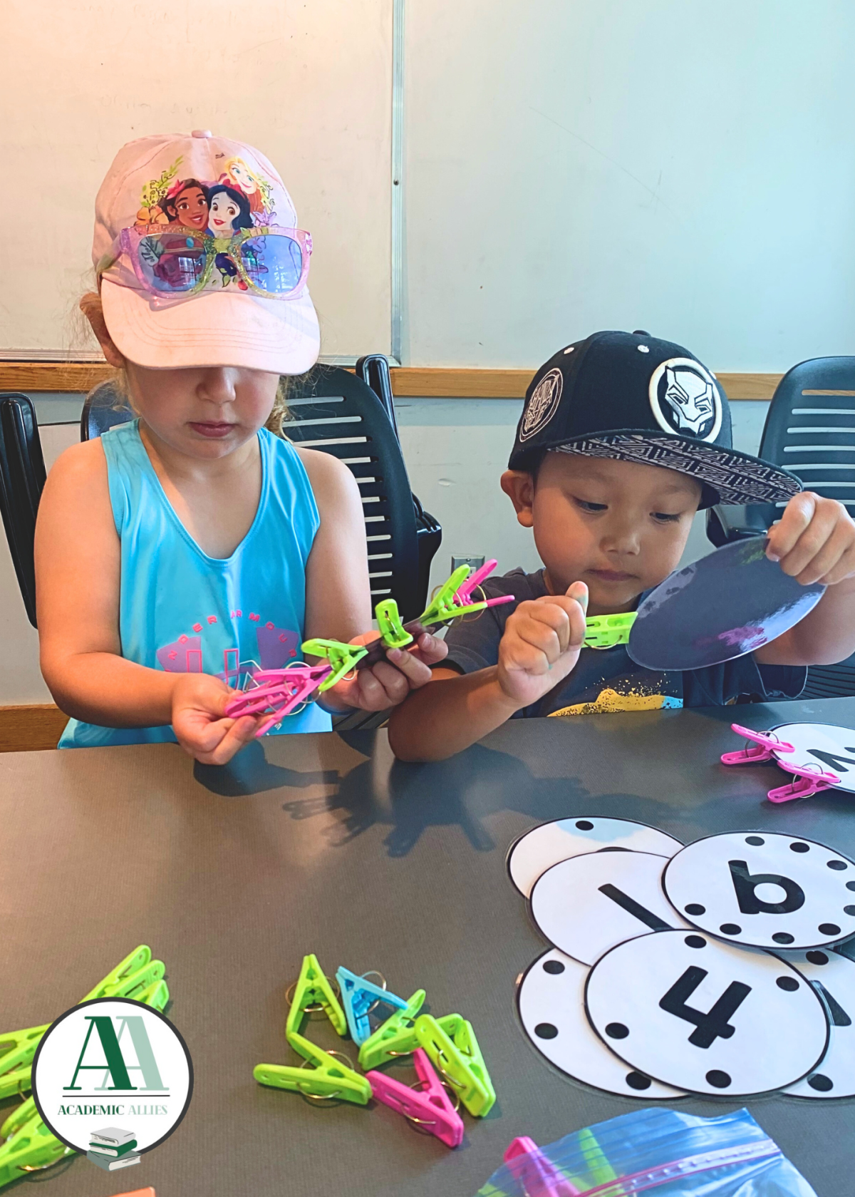 Two kids making educational crafts.