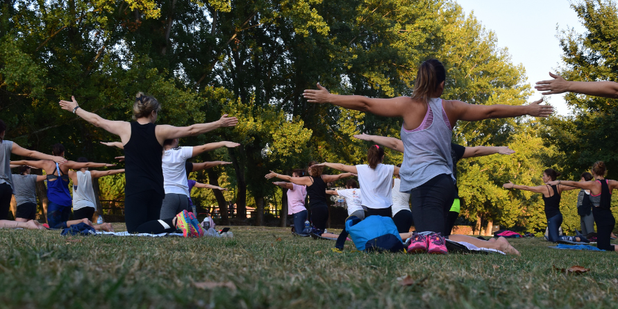People performing simple stretches together.