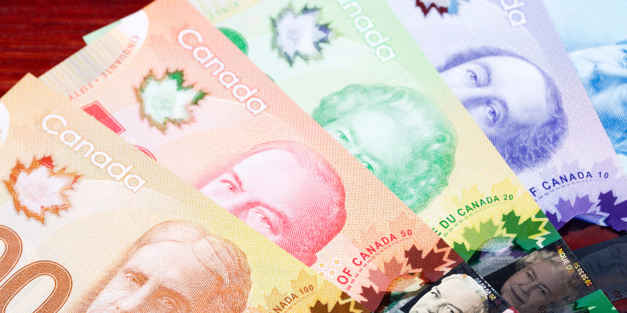 Canadian money splayed out on the table.